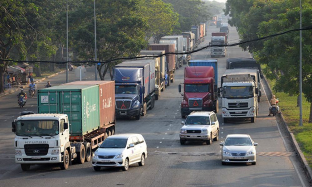 Container trucks on the road to the port